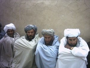 Afghans patiently waiting int he early morning hours while we completed the operation.